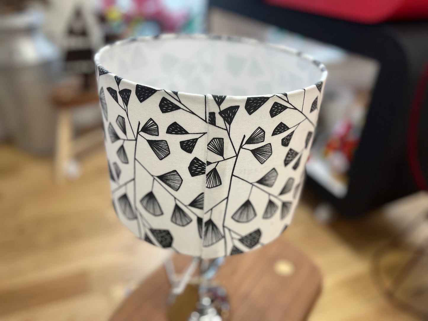 Black and white lamp shade with chrome base