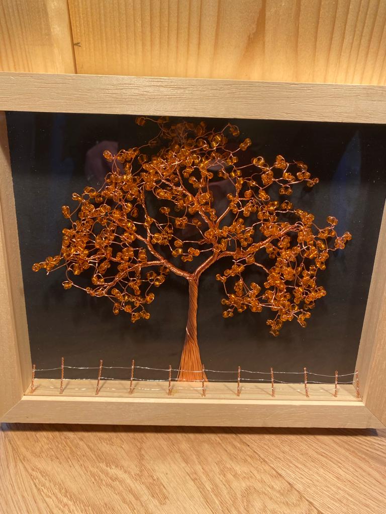 Flat copper wire tree picture.